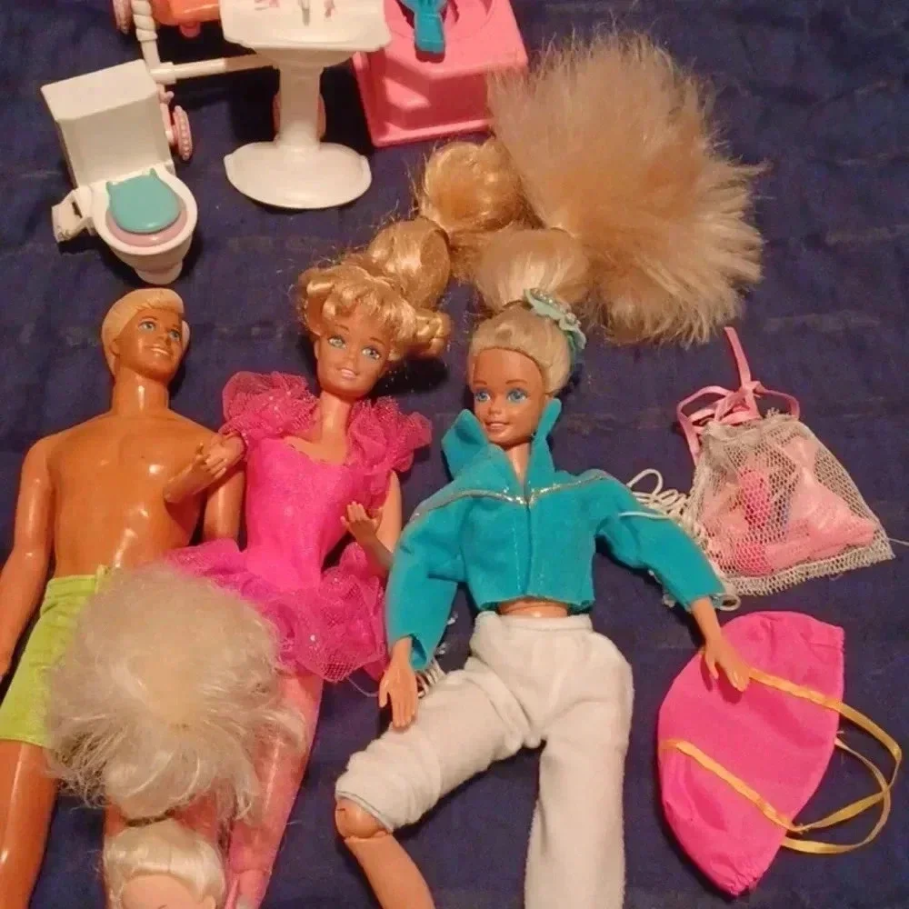 2 vintage Mattel Barbie dolls , one  Ken and one mini with extras